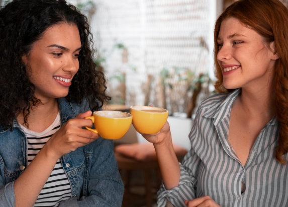 Two women enjoying tea together