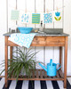 Turquoise sunflower patterned Scandinavian linen cotton kitchen tea towel by Jangneus