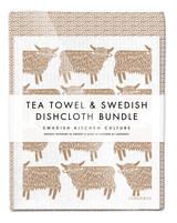 Leaves tea towel with two Cow Swedish dishcloths in sand by Jangneus