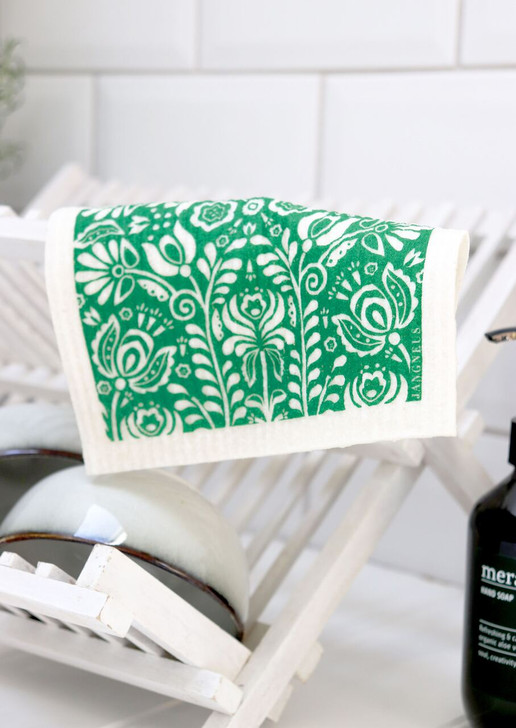 Inspired by classic Swedish design, the Scandi Bloom Swedish Dishcloth in dark green brings beauty and functionality to everyday cleaning. Crafted from natural cellulose and cotton, this reusable cloth is exceptionally absorbent, machine washable, and fully biodegradable—making it a sustainable staple for any kitchen.