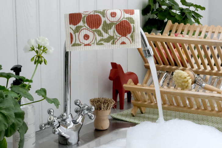 Red apple patterned reusable Swedish dishcloth made from cellulose and cotton by Jangneus