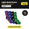 Brainstormer Trivia light-bulb socks (short): four pairs in purple, blue, black, and green, with yellow light bulbs