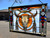 stained glass cow skull with feathers panel