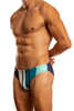 Man wearing a pair turquoise Calabria Stripe Low-Rise Swimsuit (profile view)  on a white background.