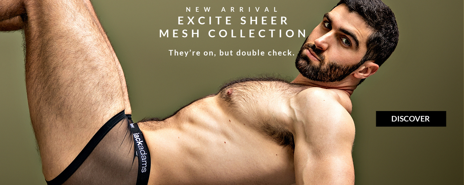 New Arrival. Excite Sheer Mesh Collection. They're on, but double check.  Image:  Model wearing a pair of  Excite Sheer Shorty Trunks in black.