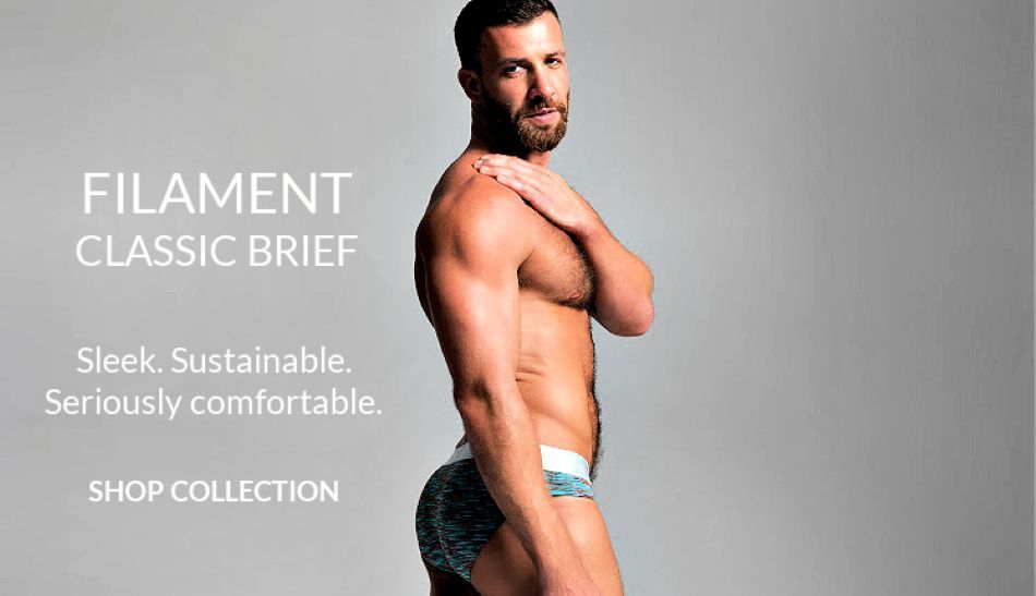 Filament Classic Brief. Sleek.  Sustainable. Seriously comfortable.  Shop the collection.  Image: Model wearing a pair of  Filament Briefs in warm teal.