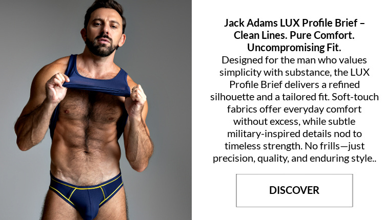 Jack Adams LUX Profile Brief (w/ piping) - clean lines. pure comfort. uncompromising fit.  Model wearing  a pair of Jack Adams LUX Profile Brief (with yellow piping) in peacoat blue, front view.