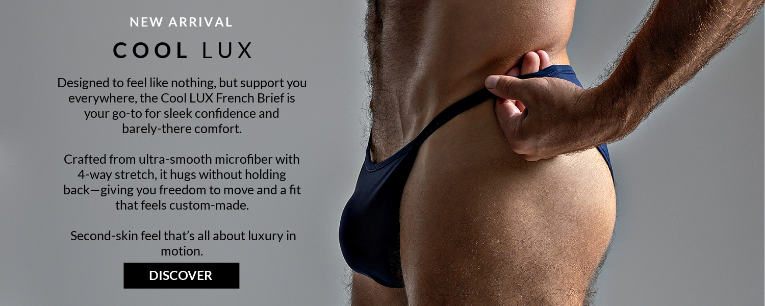 New Arrival. Cool LUX. Designed to feel like nothing, but support you everywhere. Model wearing a peacoat blue Jack Adams Cool LUX French Brief,  torso side view.