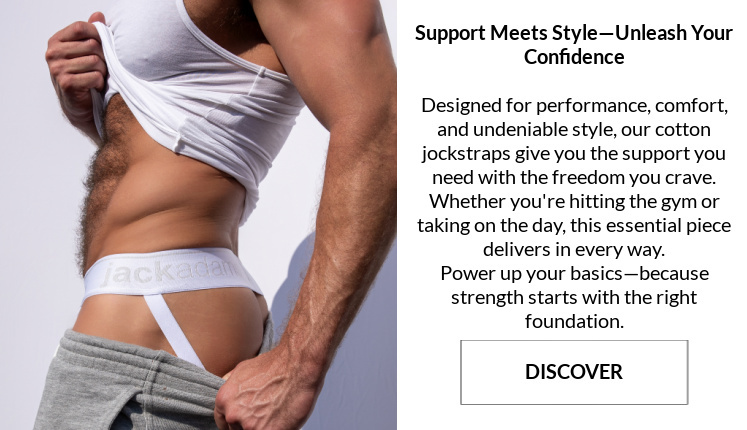 Support meets style.  Unleash your confidence.  Image: Model is wearing a pair of Jack Adams  Comfort Jockstrap in white.