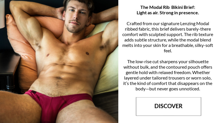 The Modal Rib Bikini Brief: Light as air. Strong in presence. Image: Model is wearing a pair of Jack Adams  Rib Modal Bikini Brief in  tibetan red.