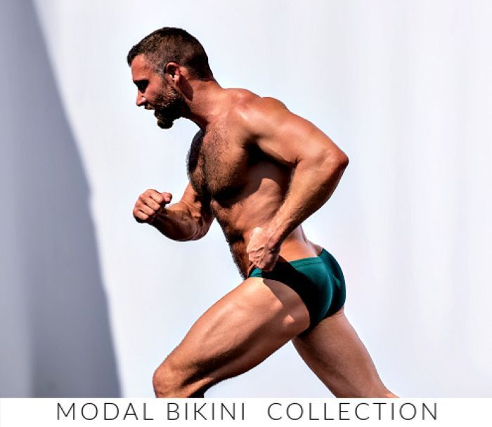 Shop Jack Adams Bikini Collection. Image: Model wearing a pair of Jack Adams  Modal Bikini Briefs in  rain forrest.