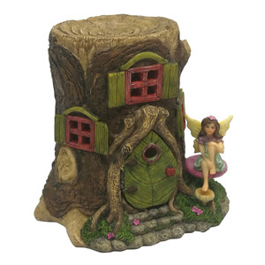 Tree Stump House with opening door