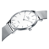 Detalle del Sandoz Classic 81445-07 con esfera blanca, caja de acero y correa de malla milanesa