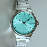 Detalle del Certina DS-7 Powermatic 80 C043.407.11.351.00 con esfera turquesa y brazalete de acero