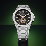 Reloj Jaguar Automático Balancier J1007/4 con esfera negra, detalles en tono cobre y brazalete de acero