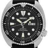 Detalle frontal del Seiko Prospex SRPE93K1 con esfera negra, bisel giratorio de buceo y correa negra