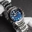 Detalle del Citizen Eco Drive Land JV1006-51L con esfera azul multifunción y caja de acero