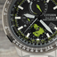 Detalle de la esfera del reloj Citizen Geo Trekk BY3006-53E con función World Time y acentos verde lima