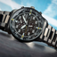 Reloj Citizen Aviator Crono CA0695-84E con esfera negra sobre fondo azul claro
