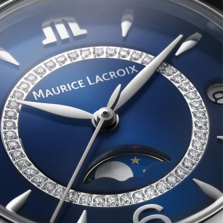 Detalle de la esfera azul del Maurice Lacroix Fiaba Moonphase 32mm con fase lunar y anillo de diamantes