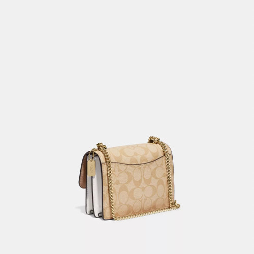 COACH Mini Klare Crossbody In Signature Canvas (@Delhi Studio)