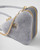 PRADA Triangular shearling and Saffiano leather mini-pouch