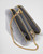 PRADA Triangular shearling and Saffiano leather mini-pouch