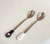 Metal  spoon for pet feeding.
Pawprint topped handle
Twin Pack