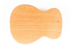 Acoustic guitar shaped bottle opener made from American Cherry. Acoustic guitar shaped bottle opener made from American Cherry.