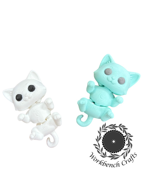 Meet our Tiny Flexi Cat — a palm‑sized cutie with wiggle‑worthy charm! Each kitten features smooth moving joints, adorable details, and irresistible personality. Perfect as a Valentine gift, desk buddy, classroom treat, or tiny surprise for any cat lover!