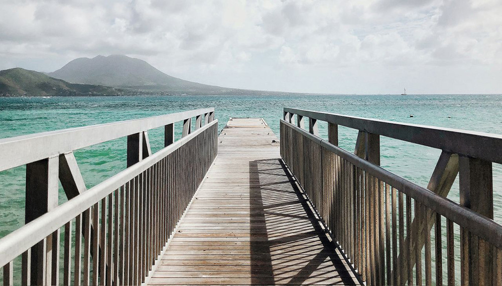 Ocean pier at Park Hyatt St. Kitts.  Fitness center, heated plunge pool, and steam room access are included with Park Hyatt St. Kitts Spa Passes for a full-day resort experience.