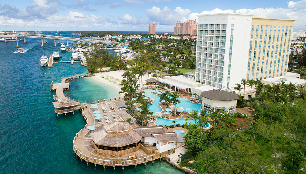 Adults only Warwick Paradise Island Bahamas day pass with all-inclusive dining, unlimited tropical cocktails, poolside snacks, and beach access for cruise passengers in Nassau