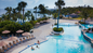 All-inclusive Resort Day Pass at Tropical Beach Resort and Spa with unlimited food, drinks, swim-up bar, and oceanfront pool views perfect for cruise passengers visiting Amber Cove