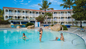 Resort Pass experience at Tropical Beach Resort and Spa including snorkeling, non-motorized water sports, and beach activities ideal for Dominican Republic cruise excursions