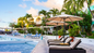 Adults-only Resort Day Pass at Ocean Point Resort Antigua with outdoor pool, beachfront lounge chairs, and Mediterranean-inspired resort setting for cruise passengers