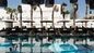 Reserved Beach Section – Lounge Chairs & Umbrellas
Enjoy your private spot on the sand with included lounge chairs and umbrellas during your O Mykonos day pass.