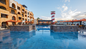 Cabo San Lucas cruise day pass at Hotel Tesoro Los Cabos including Skypool access, poolside relaxation, and spa discount