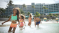 Relax on the white-sand beach, swim in the oceanfront pool, and enjoy SurfStream and climbing wall with Margaritaville Nassau Resort for a Day