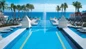 Spend your day in Cabo San Lucas at RIU Palace with a Resort for a Day pass. Enjoy unlimited dining with lunch buffet and live cooking stations, unlimited drinks, beach and pool access, lounges, umbrellas, towels, and kid-friendly activities.