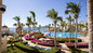 Pool lounge area at the RIU Palace in Cabo San Lucas.