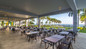 Large outdoor dining area at Hilton Rose Hall in Jamaica. 