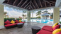 Outdoor lounge area by the pool at Jewel Grande Resort & Spa in Montego Bay, Jamaica. 