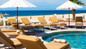 Couples, families, and groups enjoy Solmar Resort day pass with pool and beach amenities in Cabo