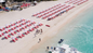 Lounge chairs lined up at Copacabana Beach Club Barbados