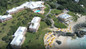Aerial view of the Coco Reef Resort beach & pool area in Bermuda. 