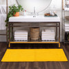 Boardwalk Bath Fiesta Yellow Machine Tufted Cotton Area Rugs