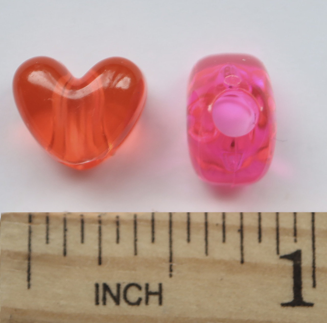 Heart Beads Candy Pink Transparent 12x10mm Pack/50