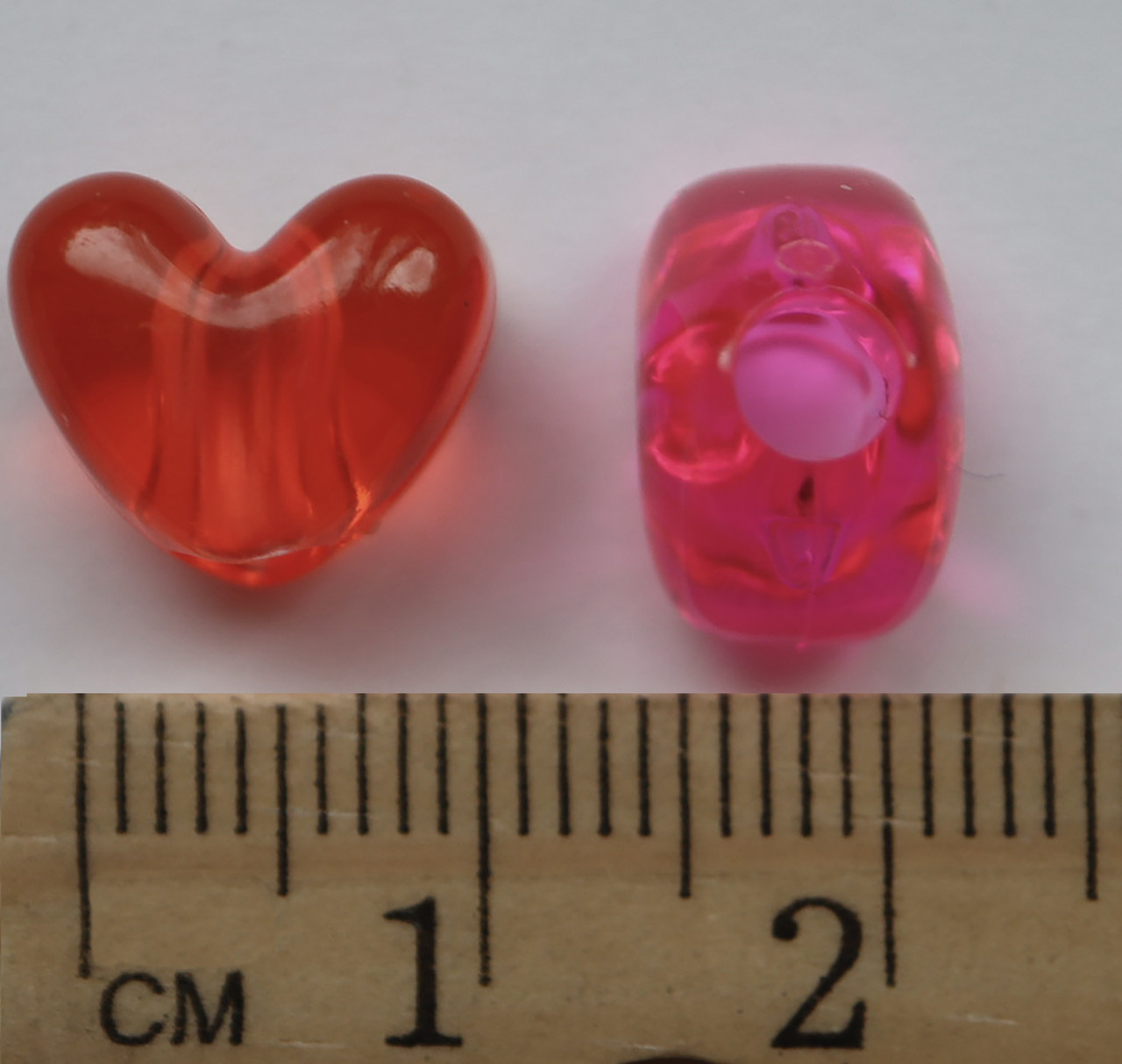 Heart Beads Candy Pink Transparent 12x10mm Pack/50