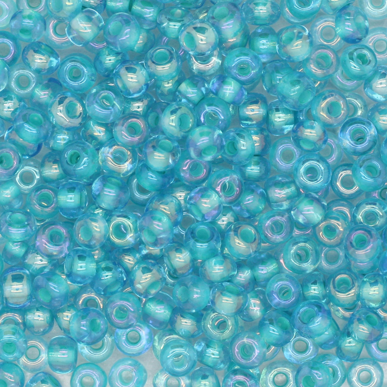 6/0 Czech Glass Seed Beads Lined Rainbow Aqua