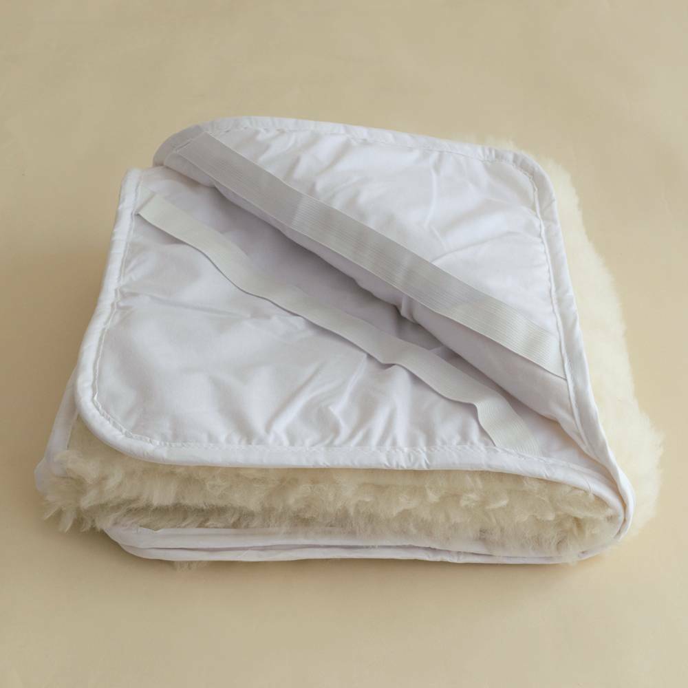 The sleep store washable wool underlay cot size